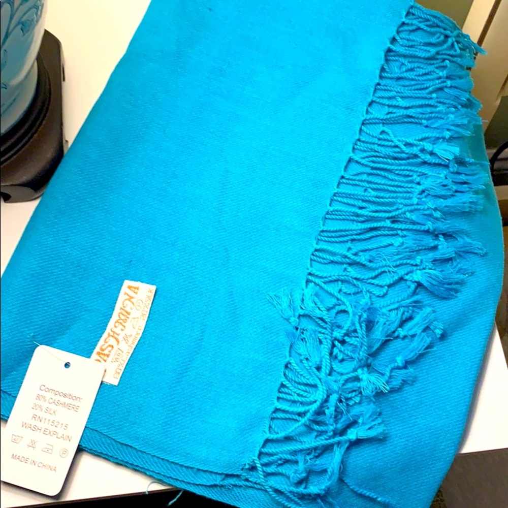 Turquoise pashmina wrap or scarf.